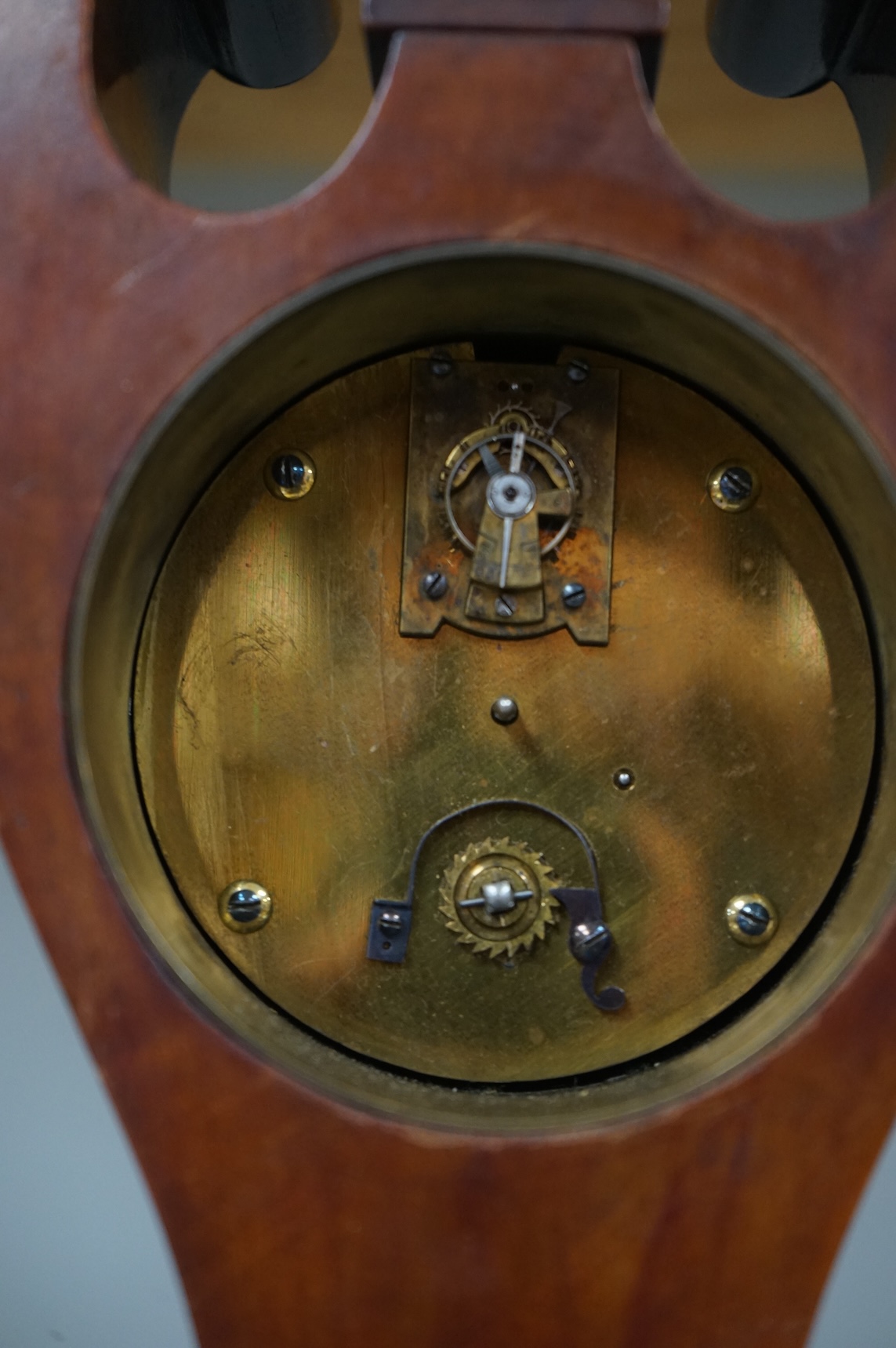 An Edwardian inlaid mahogany mantel timepiece, 28cm high